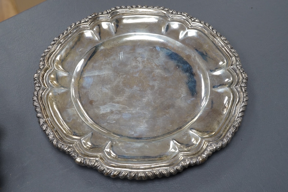 A Mexican sterling plate and small dish, an 800 standard white metal foliate bowl and a white metal dish and similar waiter, gross weight 30.5oz.
